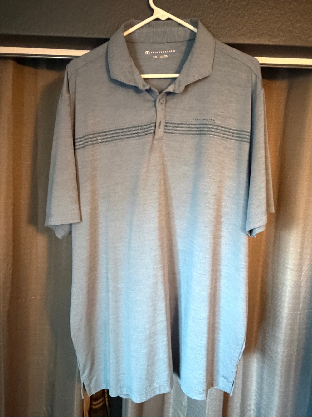 Travis Mathew Light Blue Striped Performance Polo